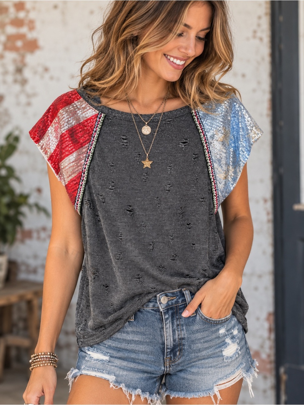 BiBi Black Distressed Top with Red & Blue Star Sequin Sleeves